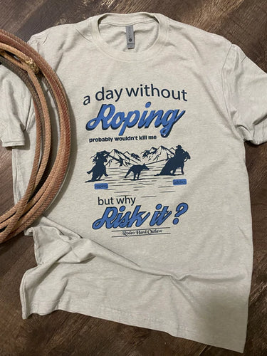 A Day Without Roping Solid Graphic Tee